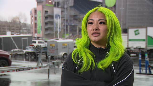 Who's the girl with green hair at the Seattle Seahawks game?