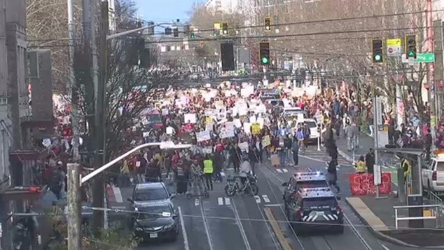 'ICE Out Now' demonstrators move through Seattle on Saturday