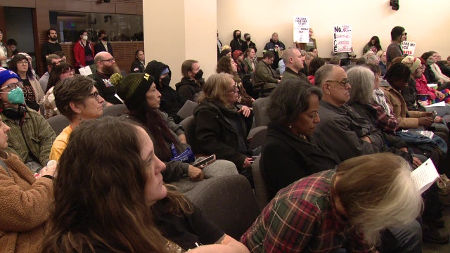Dozens rally at Tacoma City Hall demanding ICE to leave