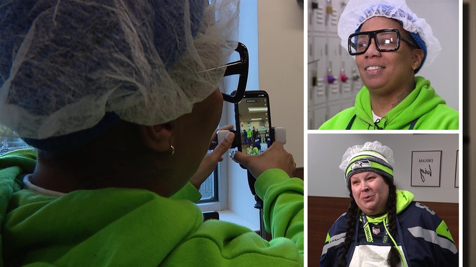 a womans ets up a phone to record a dance video for the breakroom chronicles tiktok account