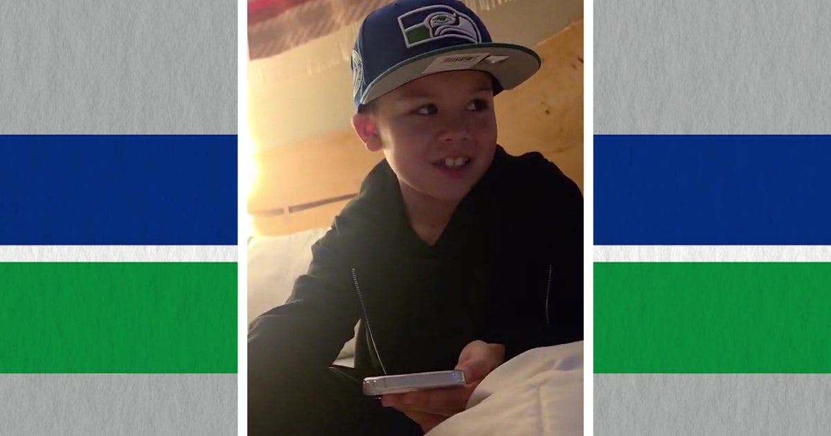 Young 12's lost football at Seattle parade leads to call from Seahawk, community response