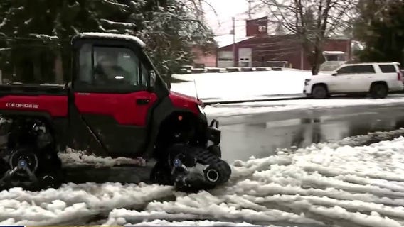 Light snow continues to fall in parts of western Washington