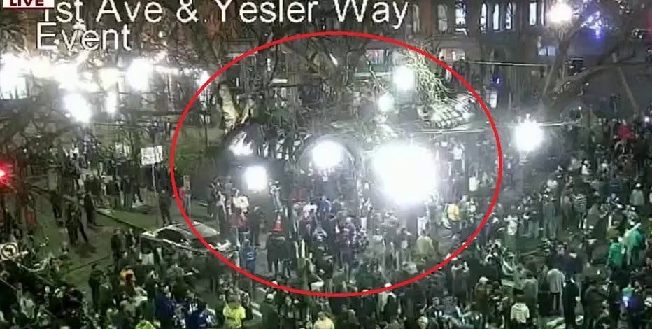 Fans seen climbing Pergola in Seattle's Pioneer Square after Seahawks' Super Bowl win