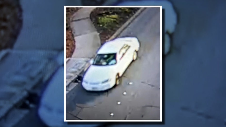 white late 1990s toyota camry suspect car