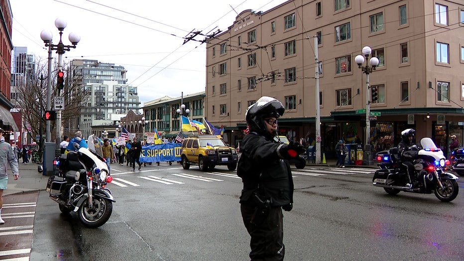 protestors march through seattle from pike place market to city center on the fourth anniversary of the ukraine and russian war