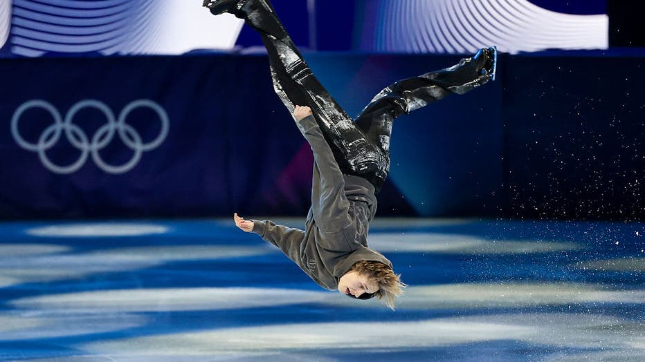 MILAN, ITALY - FEBRUARY 21: Ilia Malinin of Team United States performs a back flip in the Men's Single Skating routine during a Figure Skating Exhibition Gala on day fifteen of the Milano Cortina 2026 Winter Olympic games at Milano Ice Skating Arena on February 21, 2026 in Milan, Italy.