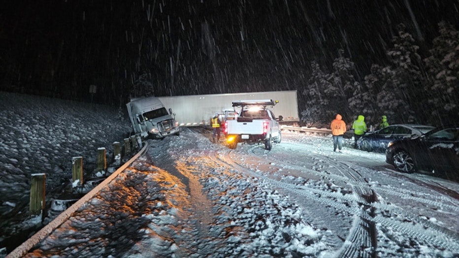 The FOX 13 Weather Team has issued a Weather Alert Day for Friday morning as snow continues to fall in the lowlands and mountain passes across western Washington. The Washington State Department of Transportation (WSDOT) has announced that westbound traffic on Snoqualmie Pass along I-90 is closed at Easton due to multiple spinouts and crashes. It is currently 