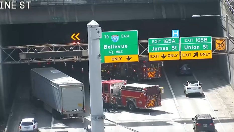 Four lanes of southbound I-5 are blocked in Seattle due to a crash, according to the Washington State Department of Transportation (WSDOT). WSDOT sent out the initial alert on social media just after 1 p.m. Crews say the four center lanes of southbound I-5 near Union Street (milepost 166) in Seattle are now blocked. Incident Response, the Washington State Patrol and emergency crews are at the scene. 