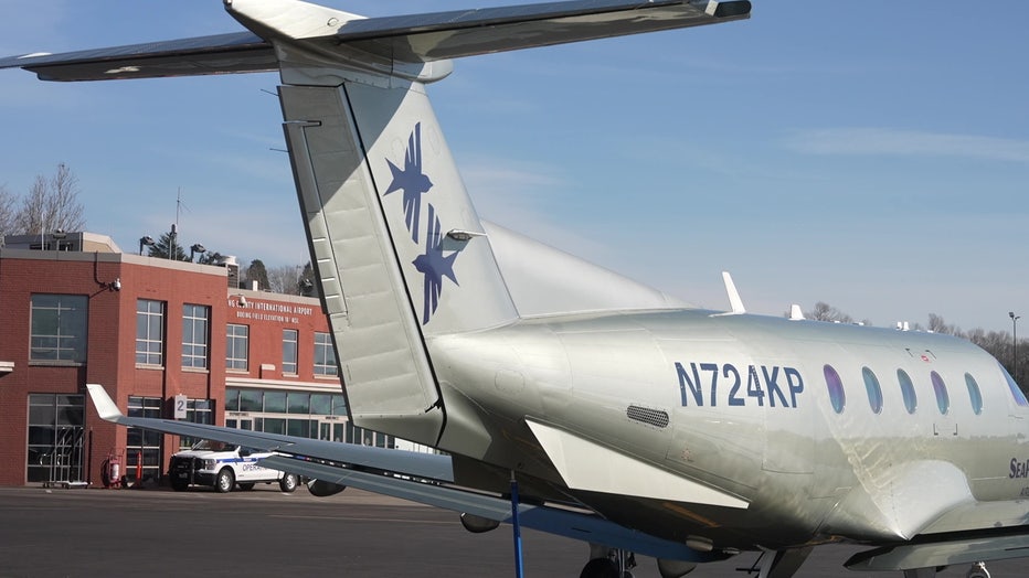 airplane sits on the runway of boeing international field in seattle