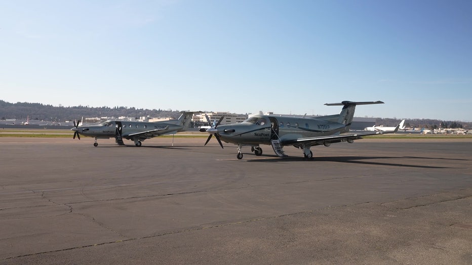 airplane sits on the runway of boeing international field in seattle