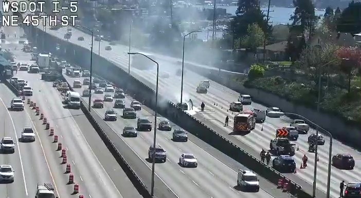 Lanes of southbound I-5 in Seattle blocked by burning car