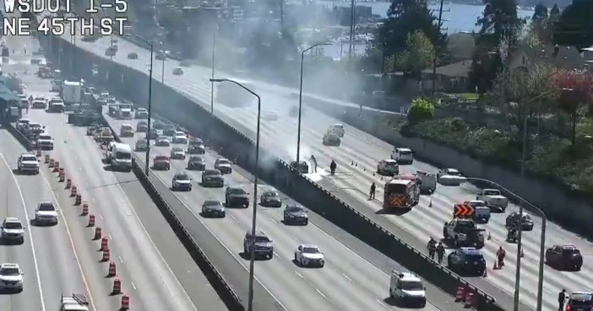 Lanes of southbound I-5 in Seattle blocked by burning car