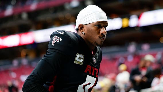 Ex-football player accused of posing as former UW QB Michael Penix, other NFL pros in $20M fraud case