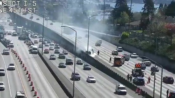 Lanes of southbound I-5 in Seattle blocked by burning car