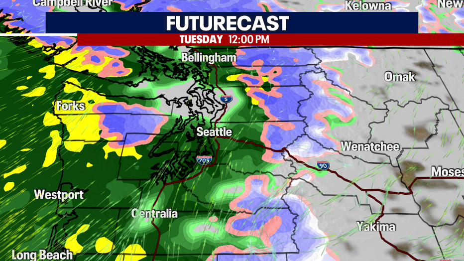 A map showing the forecasted rain, snow and cloud cover for Tuesday midday in Western Washington.