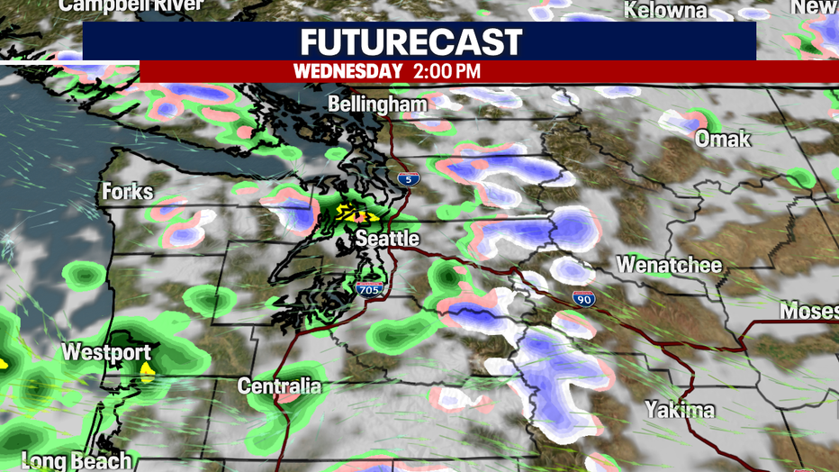 A map showing the forecasted rain, snow and clouds for Tuesday afternoon.