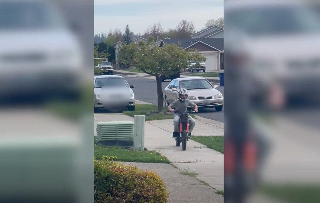 Spokane, WA woman chases child on sidewalk with car: video