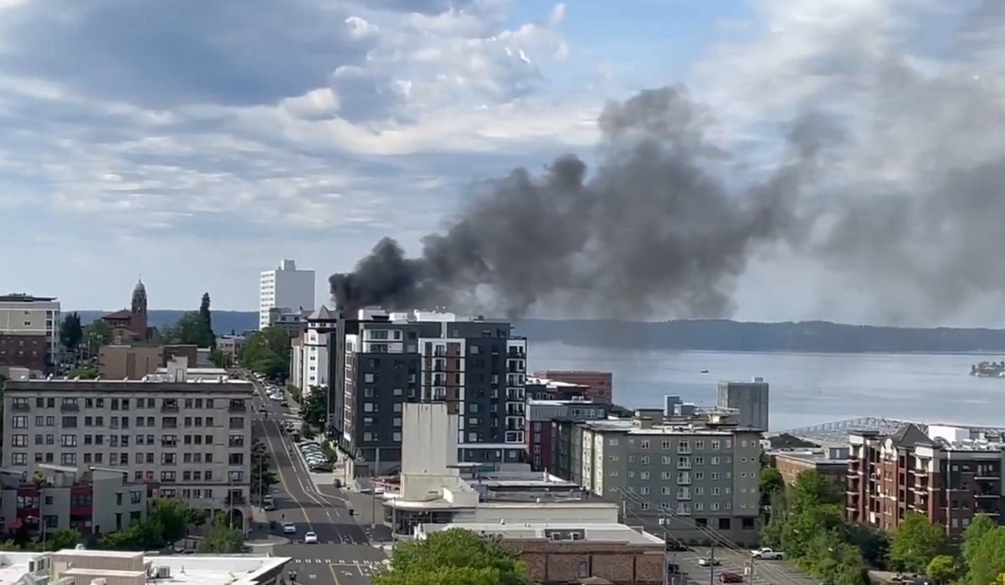 Tacoma firefighters respond to rooftop fire at Temple Theatre