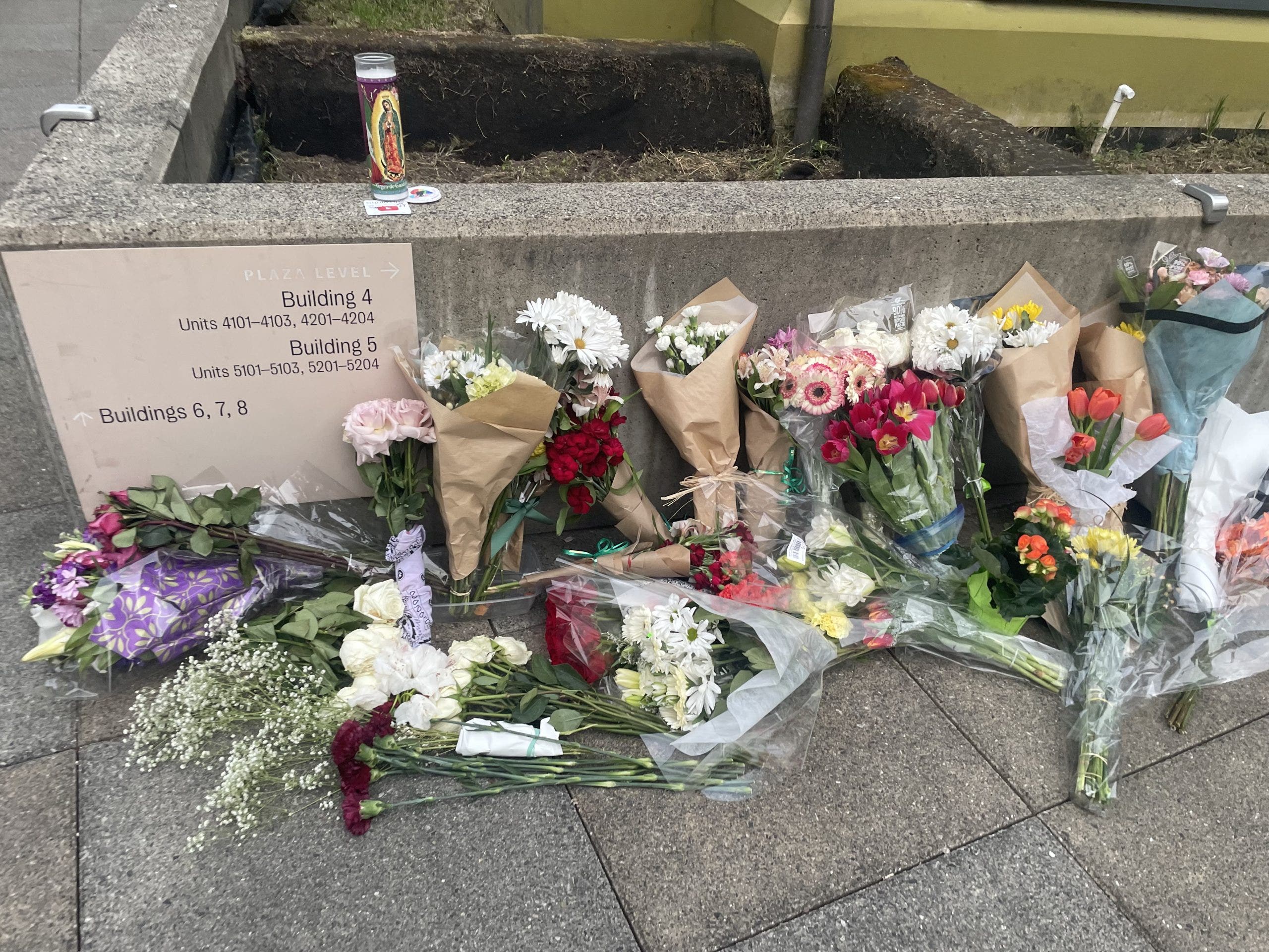 Memorial grows outside apartment complex where UW student was killed