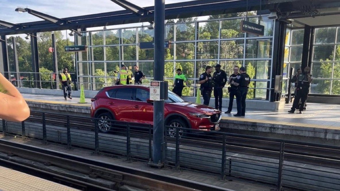 Car drives onto light rail tracks at Seattle's Mount Baker station