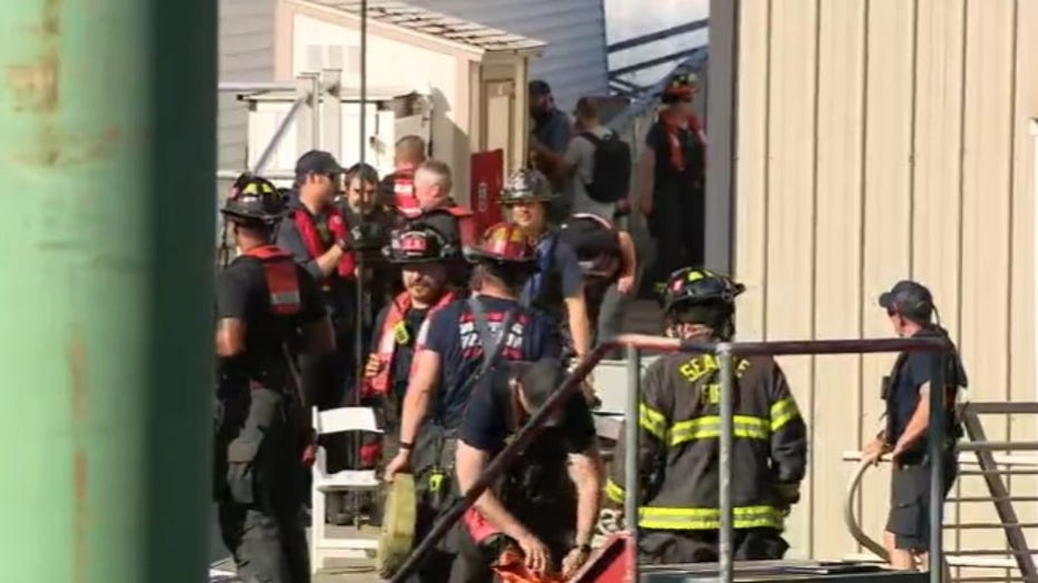 Firefighters responded to a sinking vessel call at the MV Skansonia — a popular Seattle ferry boat wedding venue — on Lake Union Monday morning.
According to the Seattle Fire Department crews at the scene, multiple pumps are currently being used to clear water from the historic vessel. However, water continues to enter the ship as crews pump it out, and emergency responders have not yet located the source of the leak.
