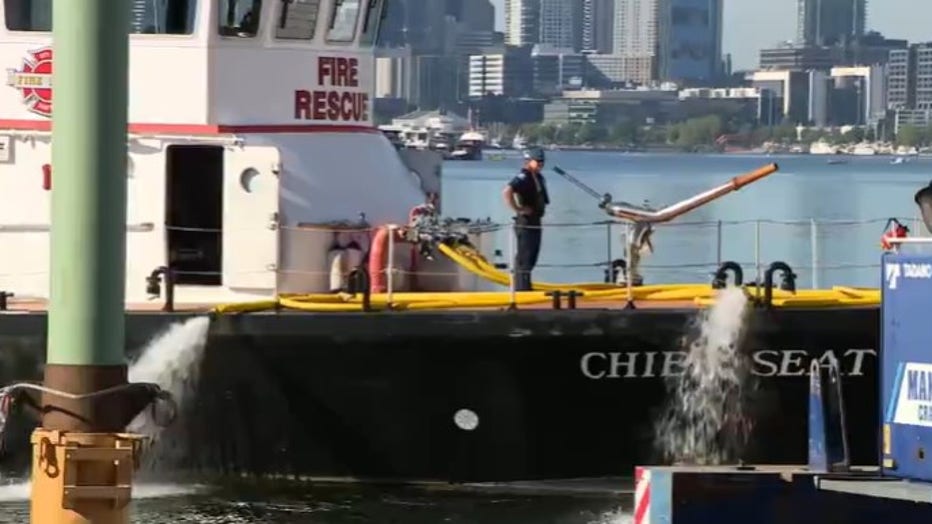 Firefighters responded to a sinking vessel call at the MV Skansonia — a popular Seattle ferry boat wedding venue — on Lake Union Monday morning.
According to the Seattle Fire Department crews at the scene, multiple pumps are currently being used to clear water from the historic vessel. However, water continues to enter the ship as crews pump it out, and emergency responders have not yet located the source of the leak.
