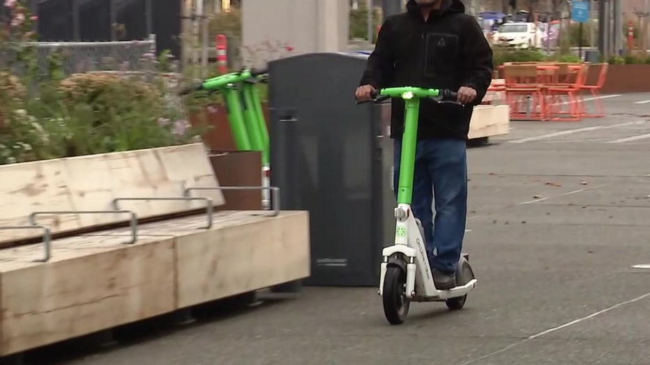 Man Rides Lime Scooter In Pioneer Square