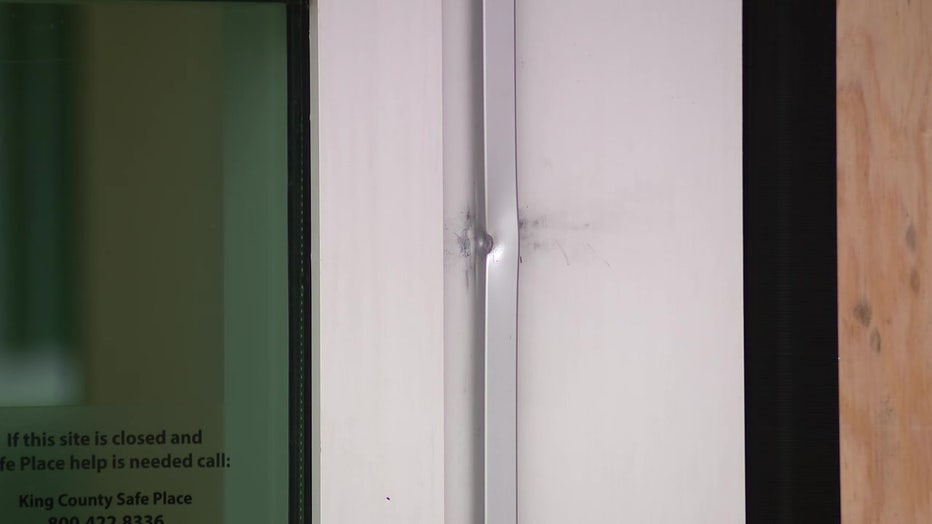 Damage to the exterior of the Van Asselt Community Center following a shooting on June 26, 2026