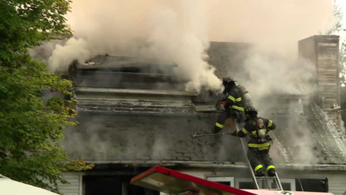 Deck fire spreads to roof, interior of northeast Seattle home