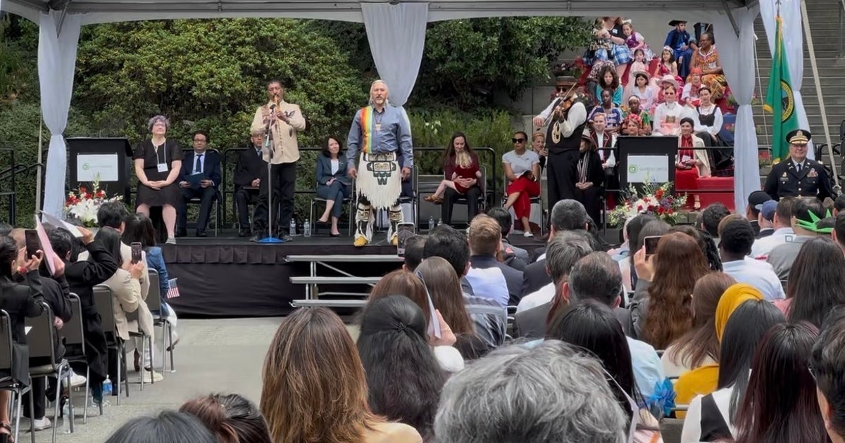 250 people sworn in together as US citizens in Seattle for America 250