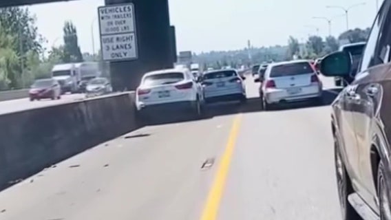Caught on camera: Pierce County, WA man uses car to stop runaway SUV