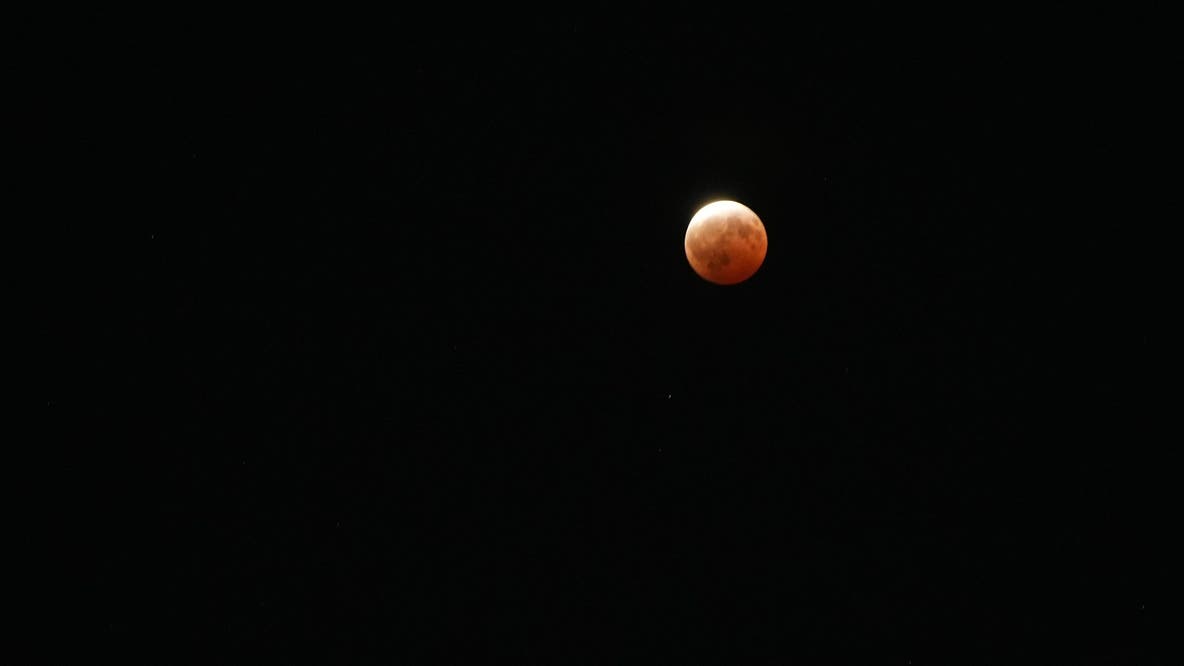 Did you see it? Partial lunar eclipse glows over Seattle