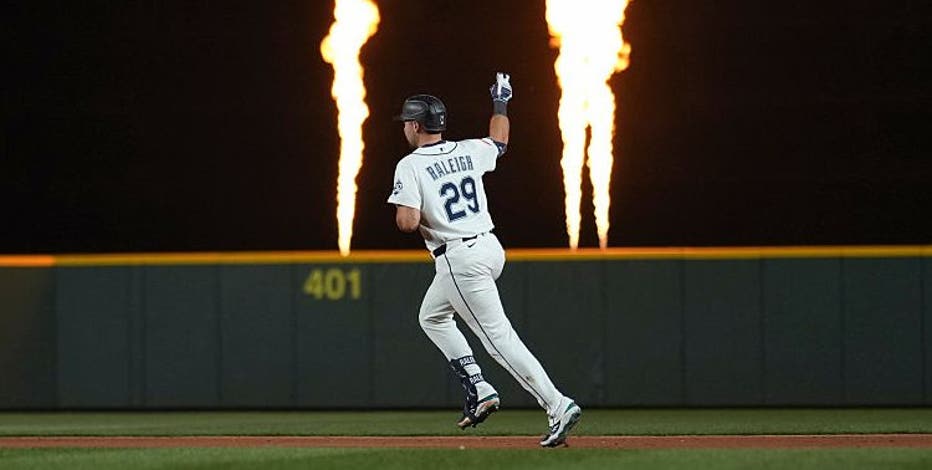 Cal Raleigh hits three home runs as Seattle Mariners beat Phillies 9-2