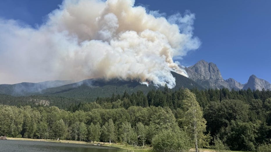 The Border 2 Fire, burning northeast of Ross Lake along the Washington-Canadian border, has reached 5,123 acres and remains 0% contained.