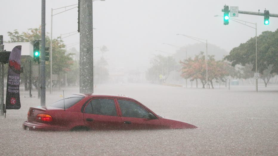 car submerged in water in hawaii from storm