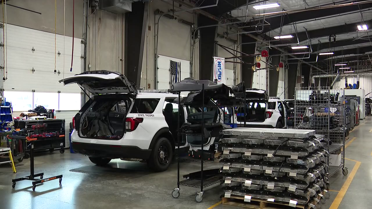 Inside the Tumwater facility building Washington State Patrol cars
