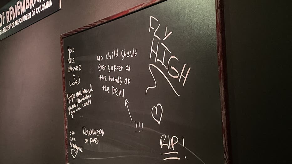 Visitors can write down tributes to victims on a wall of rememberance.