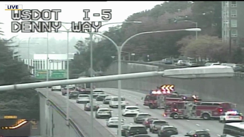 Multi-vehicle rollover crash on northbound I-5 near Denny Way blocks lanes Thursday morning, prompting a brief response for reported trapped occupants
