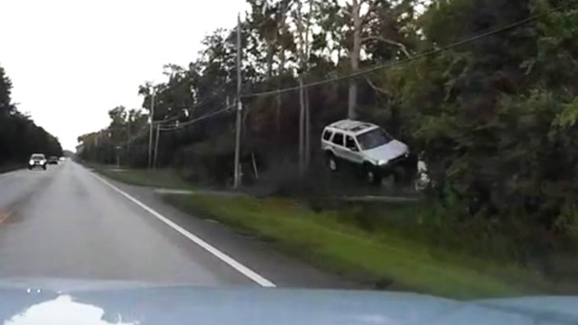 Off duty officer rescues crash victim