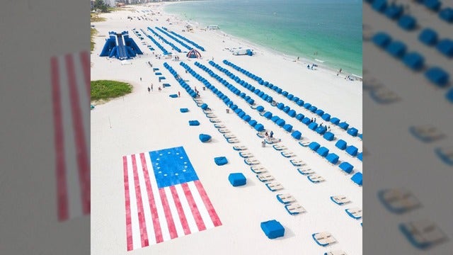 Resort builds giant Betsy Ross flag made out of towels on Florida beach