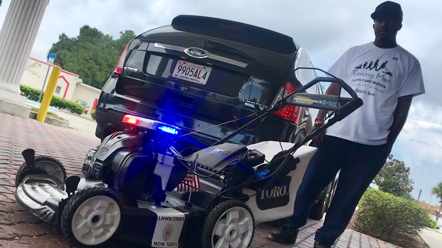 Apopka police officers mow lawns for community members in need
