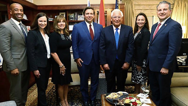 DeSantis, cabinet fire top financial regulator