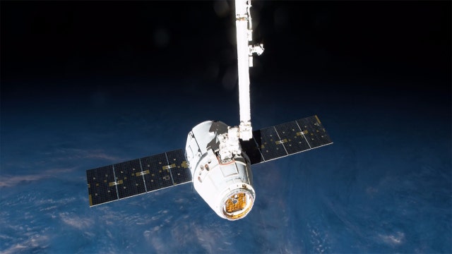 Launch of SpaceX's Dragon capsule scrubbed due to weather