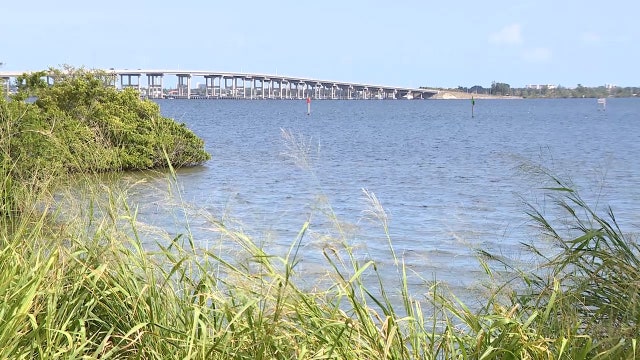 Residents along the river keep an eye out for potential flooding
