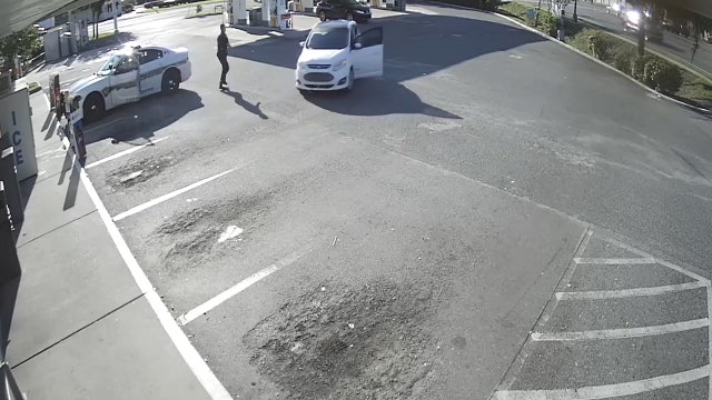 Officer saves senior from back-rolling car