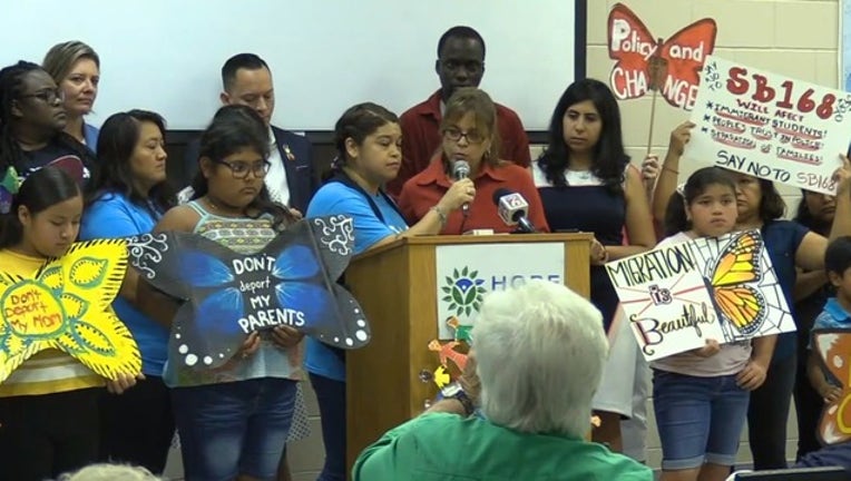 a83549c3-immigration lawsuit_1563295250758.png-402429.jpg