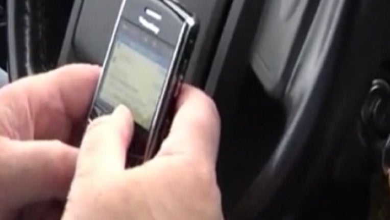 560b5d09-texting while driving_1556071581810.jpg-402429.jpg