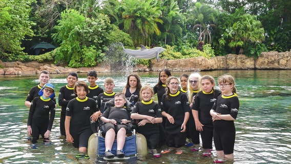 192 children with disabilities, illnesses treated to day with dolphins at Discovery Cove in Orlando