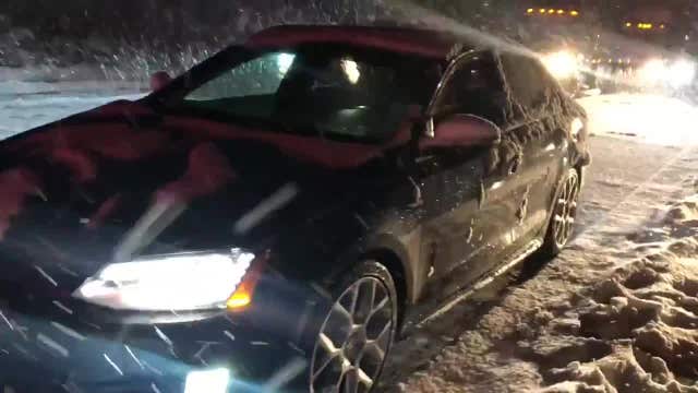Couple celebrate Thanksgiving while stranded on road by winter storm