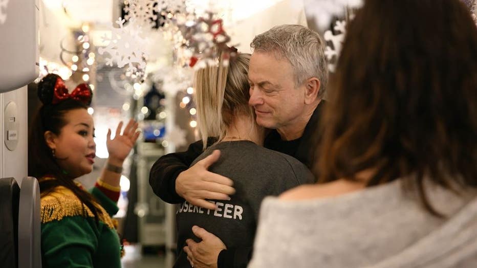 GARY-SINISE-HUGGING-PIC.jpg